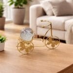 Metal Butterfly cycle holding Glass Ball